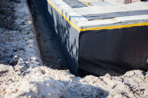 Professional Waterproofing technician working in Bethel, WA